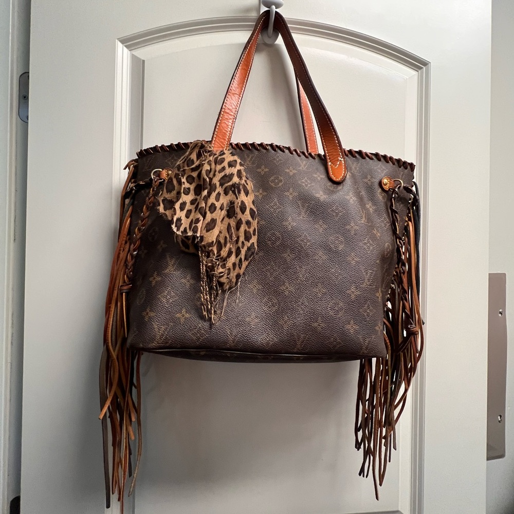 Distressed Louis Vuitton Bag